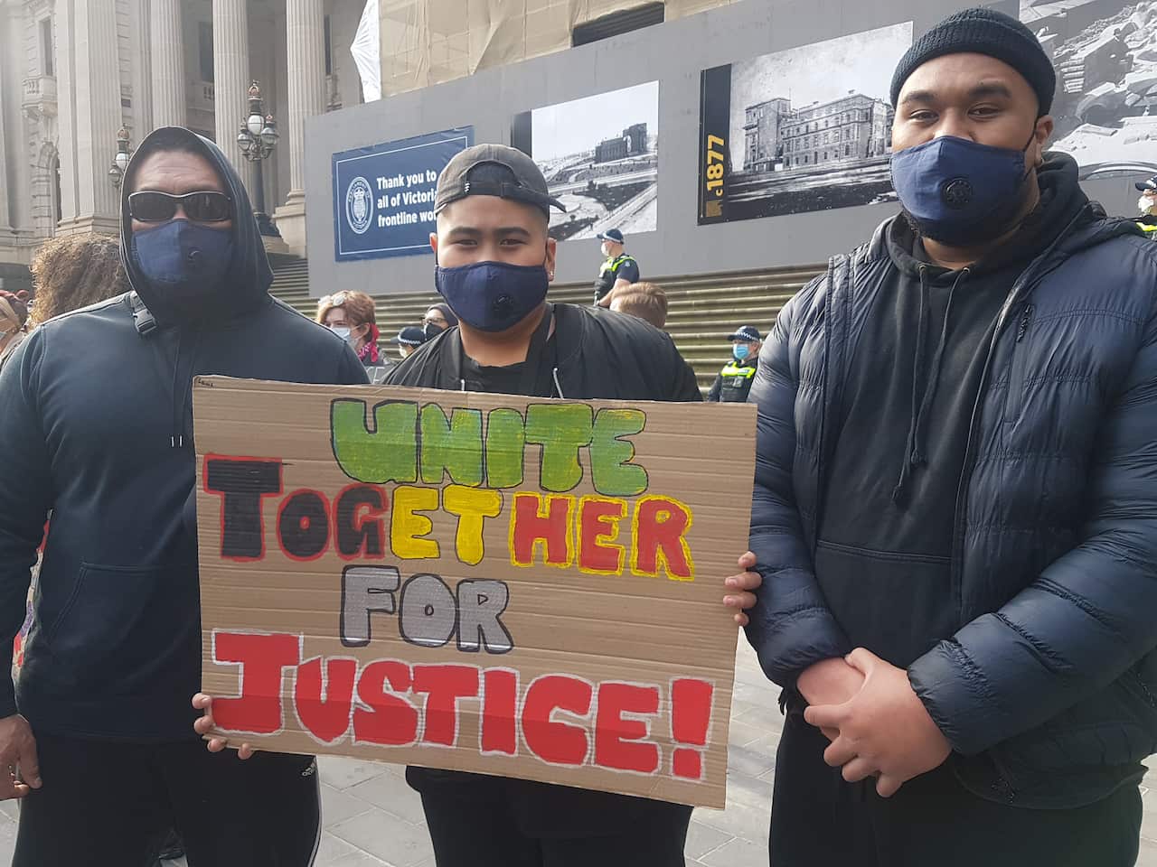Jay (R) attended the Black Lives Matter rally in Melbourne.