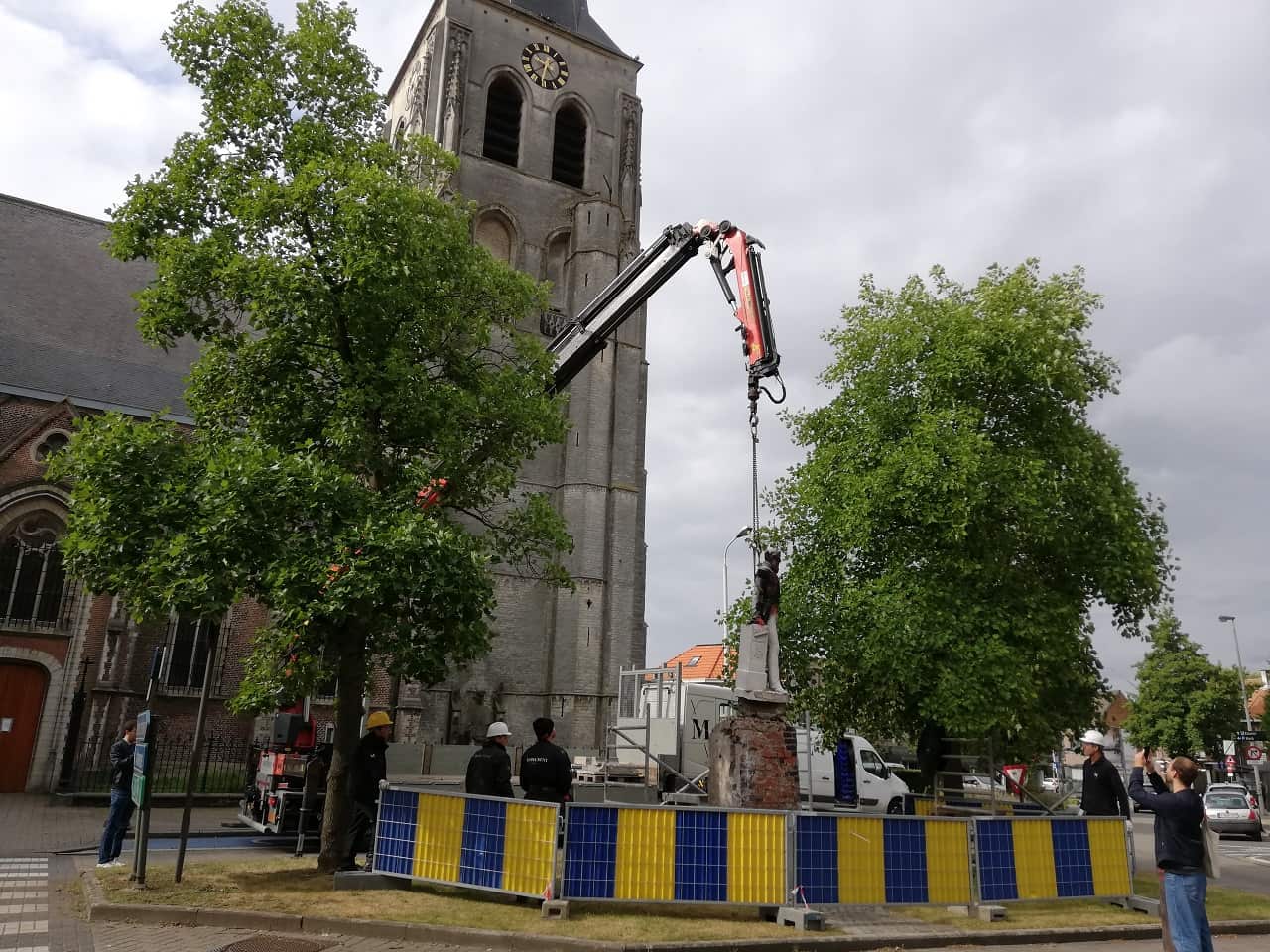 A King Leopold II statue being removed by local authorities last week.