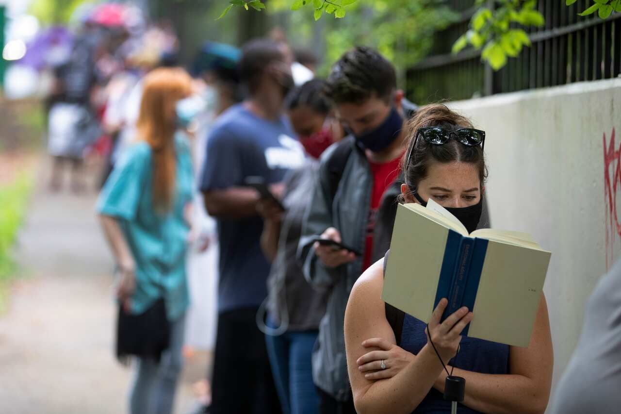 A woman waits in line to vote in Atlanta in June, 2020. 