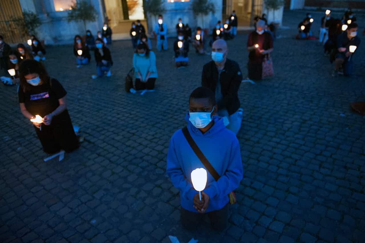 A candlelit protest in Rome against racism and in solidarity with George Floyd, who died in police custody in the US.