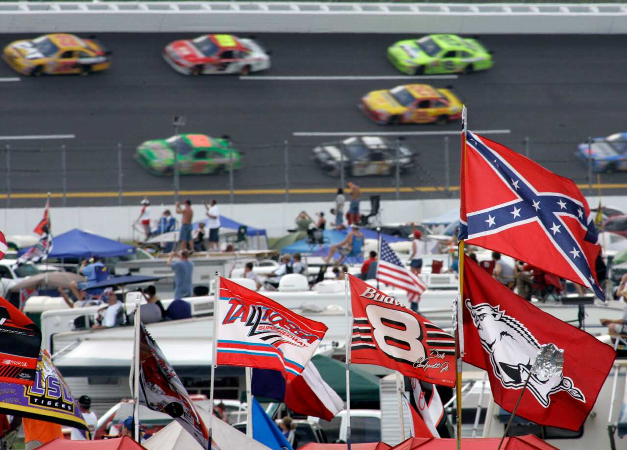 A confederate flag flies during a NASCAR auto race at Talladega Superspeedway in Talladega, Alabama.