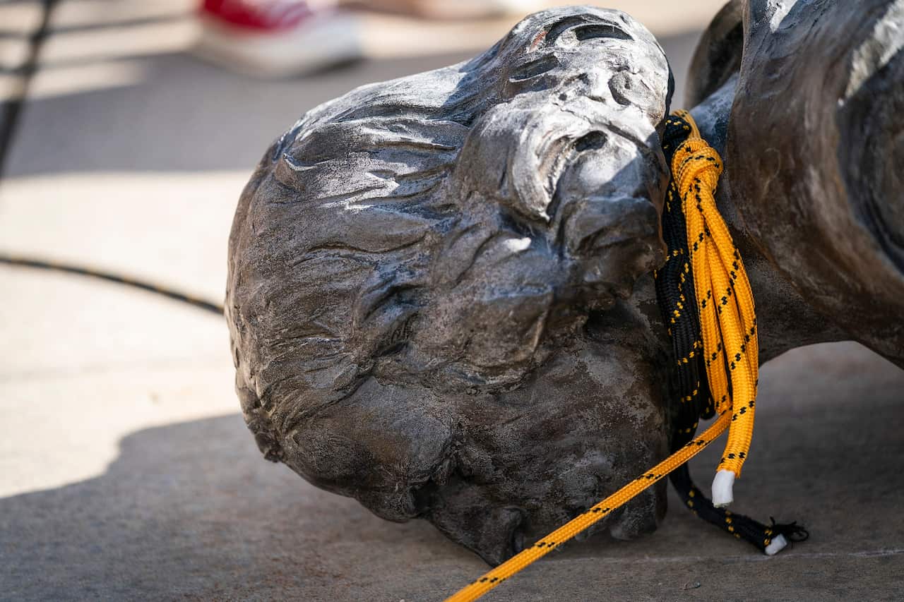 The Christopher Columbus statue after it was toppled by activists in front of the Minnesota State Capitol in St Paul.