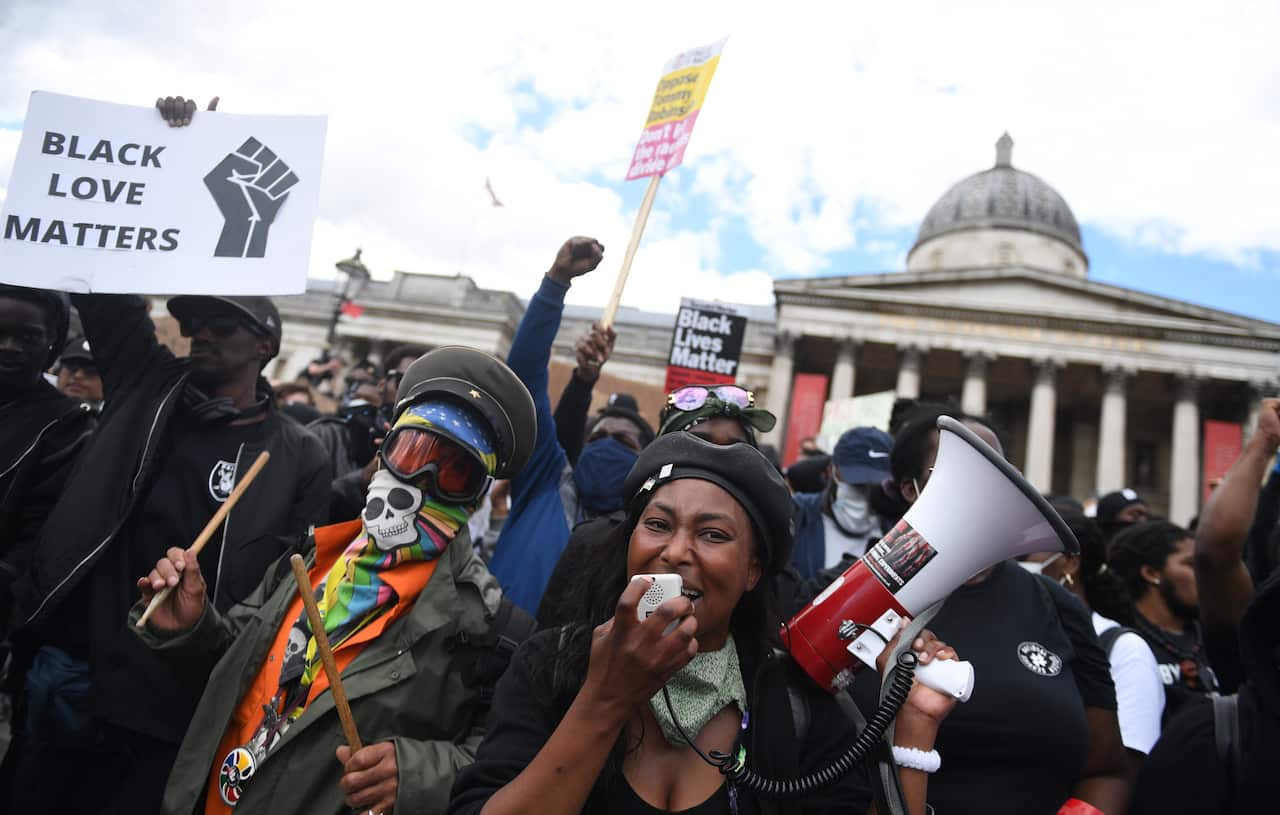 Protesters gather in Trafalgar Square during a Black Lives Matter (BLM) demonstration in London.