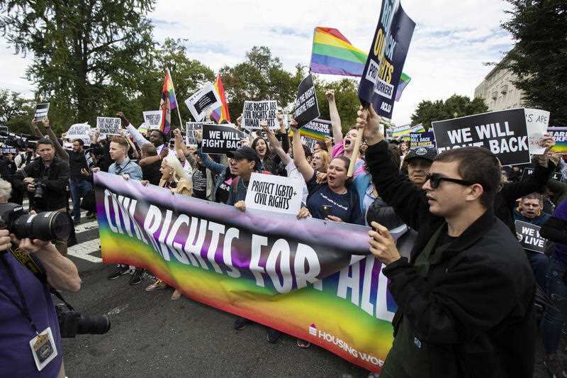 LGBTQI+ supporters in front of the U.S. Supreme Court, Tuesday, Oct. 8, 2019, in Washington. 