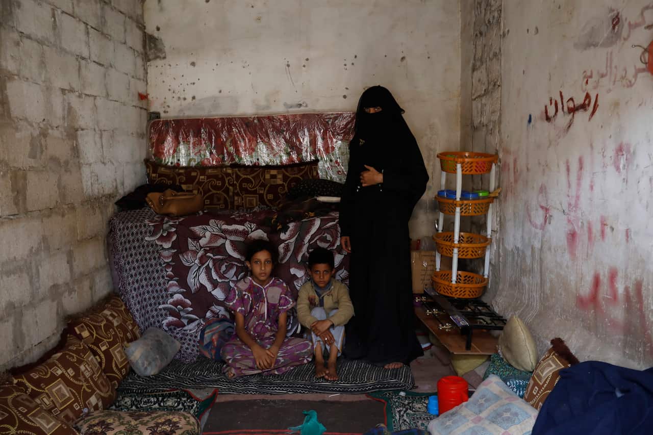 Conflict-affected members of a Yemeni family inside a one-room rental house, in Sanaa, Yemen.