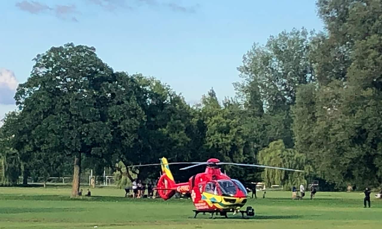 An air ambulances after it landed in Forbury Gardens in the town centre of Reading, England.