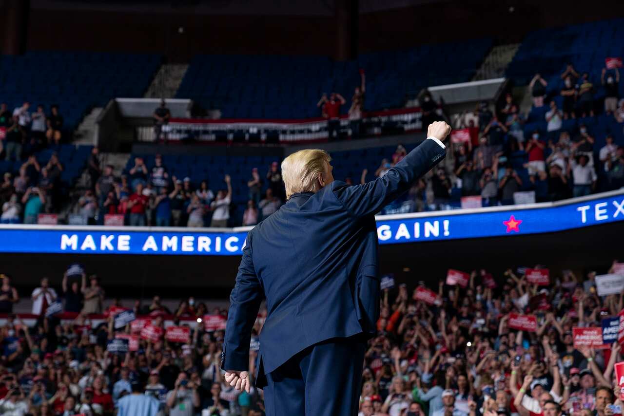 President Donald Trump arrives on stage to speak at a campaign rally at the BOK Center in Tulsa, Oklahoma.