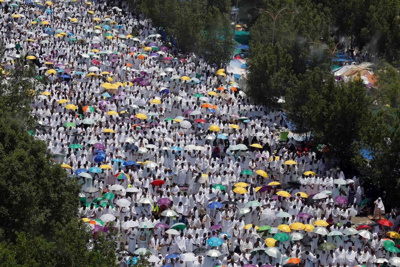 Muslim pilgrims pray during the annual hajj pilgrimage, near the holy city of Mecca August 2019.  
