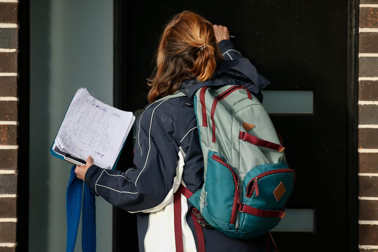 Victoria State Government Health and Human Services people knock on doors in Broadmeadows, Melbourne, to check if people have any symptoms of COVID19.