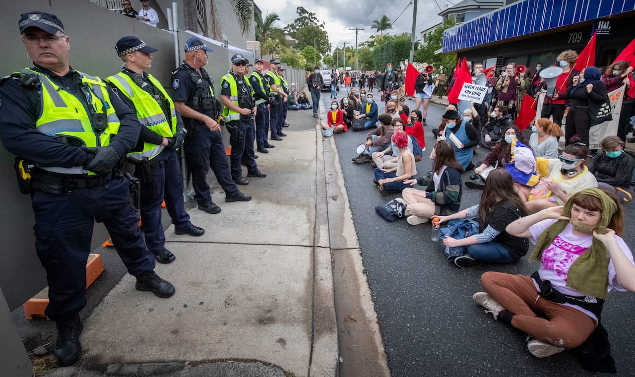 Protesters at the Kangaroo Point Central Hotel in Brisbane