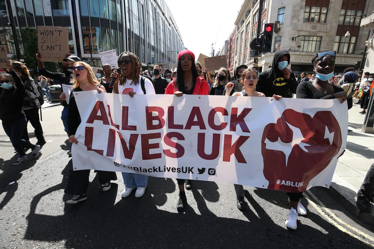 A Black Lives Matter protest makes its way along Oxford Street, London, in June 2020.
