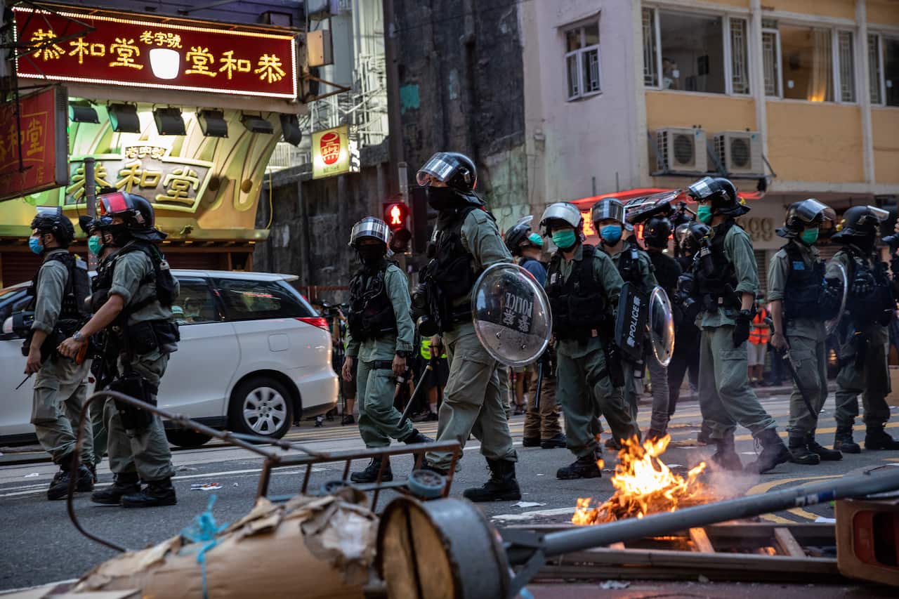 Police and protesters during a Hong Kong rally on July the 1st