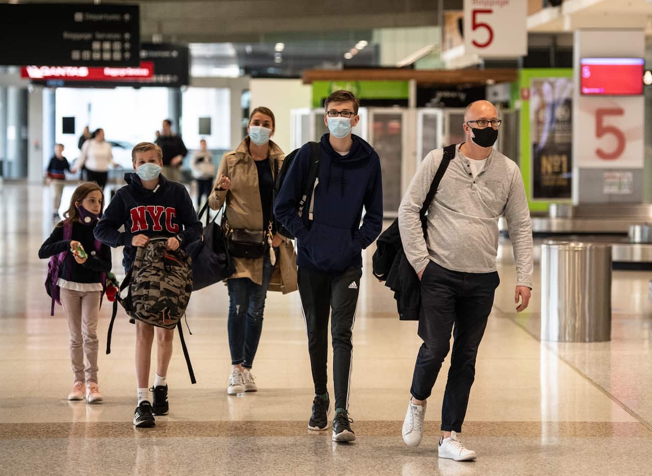 All travellers returning from overseas must quarantine in a hotel for two weeks.