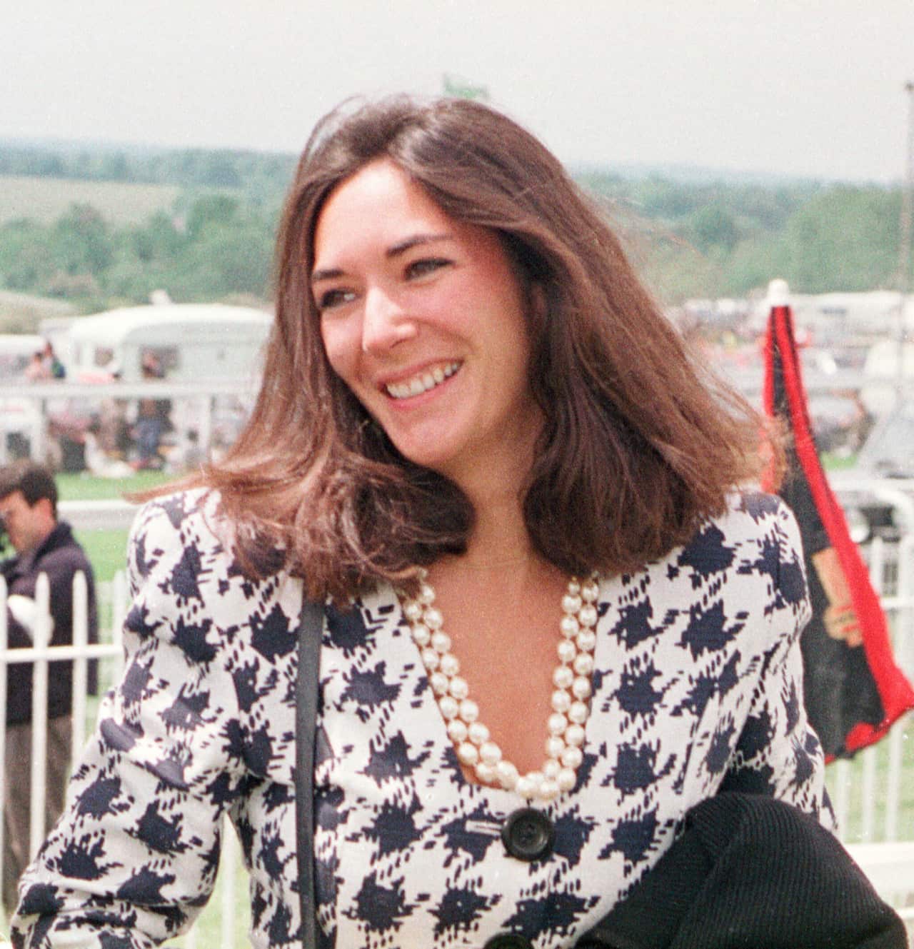  In this 5 June  1991 file photo, British socialite Ghislaine Maxwell arrives at Epsom Racecourse. 