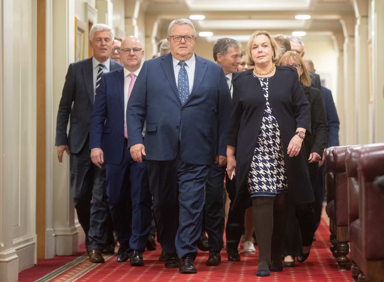 New leader Judith Collins with new deputy leader Gerry Brownlee (left) emerge from the vote at New Zealand Parliament in Wellington, Tuesday, 14 July, 2020. 