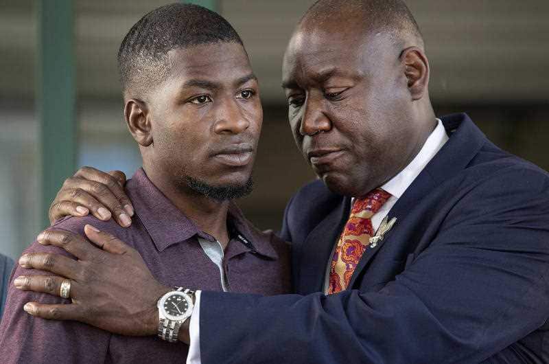 Quincy Mason, left, son of George Floyd, and attorney Benjamin Crump during a news conference in Minneapolis on Wednesday, June 3, 2020