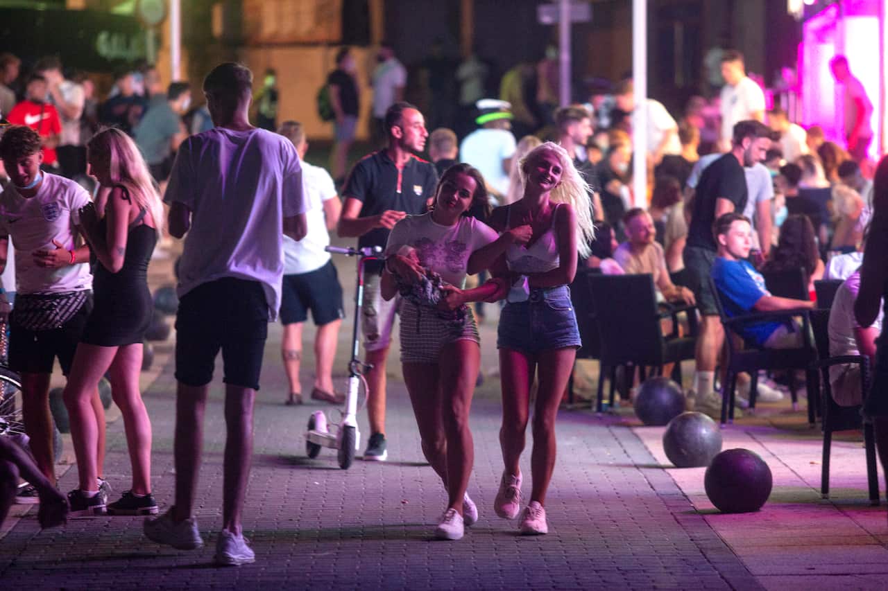 Young tourists at the beach resort of Magaluf on the Spanish Balearic island of Mallorca, Spain.