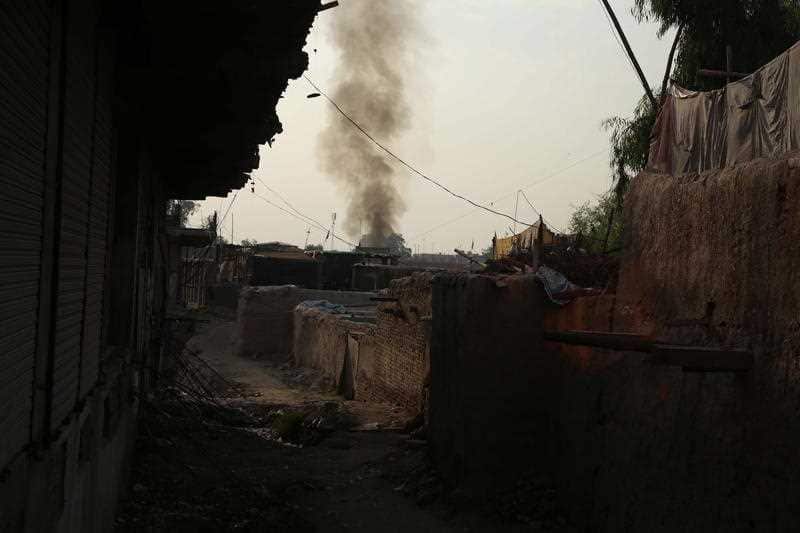 Smoke billows from a prison after a militant attack in Jalalabad, Afghanistan, 03 August 2020