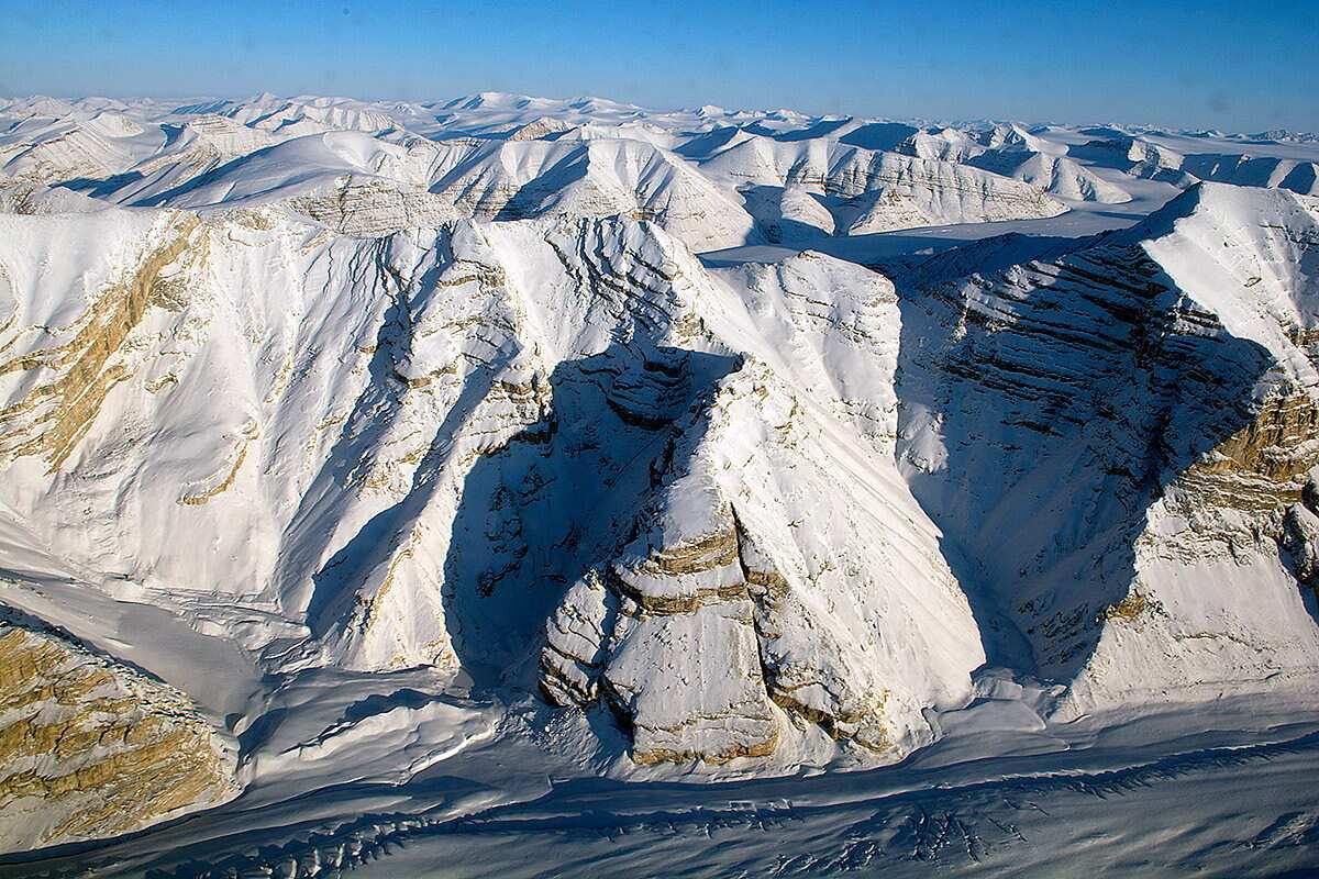 An aerial view taken during an Operation IceBridge survey flight of glaciers on Canada's Ellesmere Island in April 2014. 