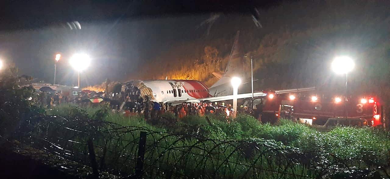 The Air India Express flight that skidded off a runway while landing at the airport in Kozhikode, Kerala state, India. 