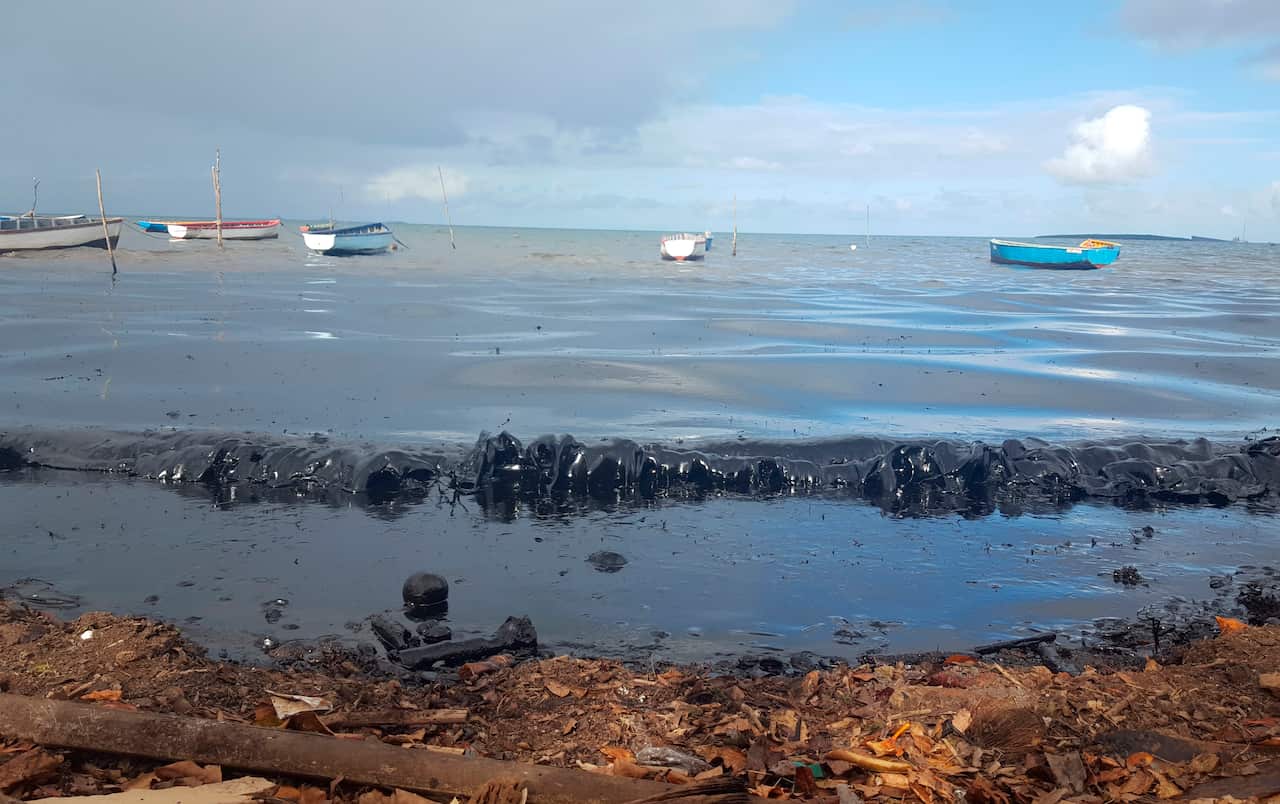 Oil polluting the foreshore of the public beach in Riviere des Creoles, Mauritius.