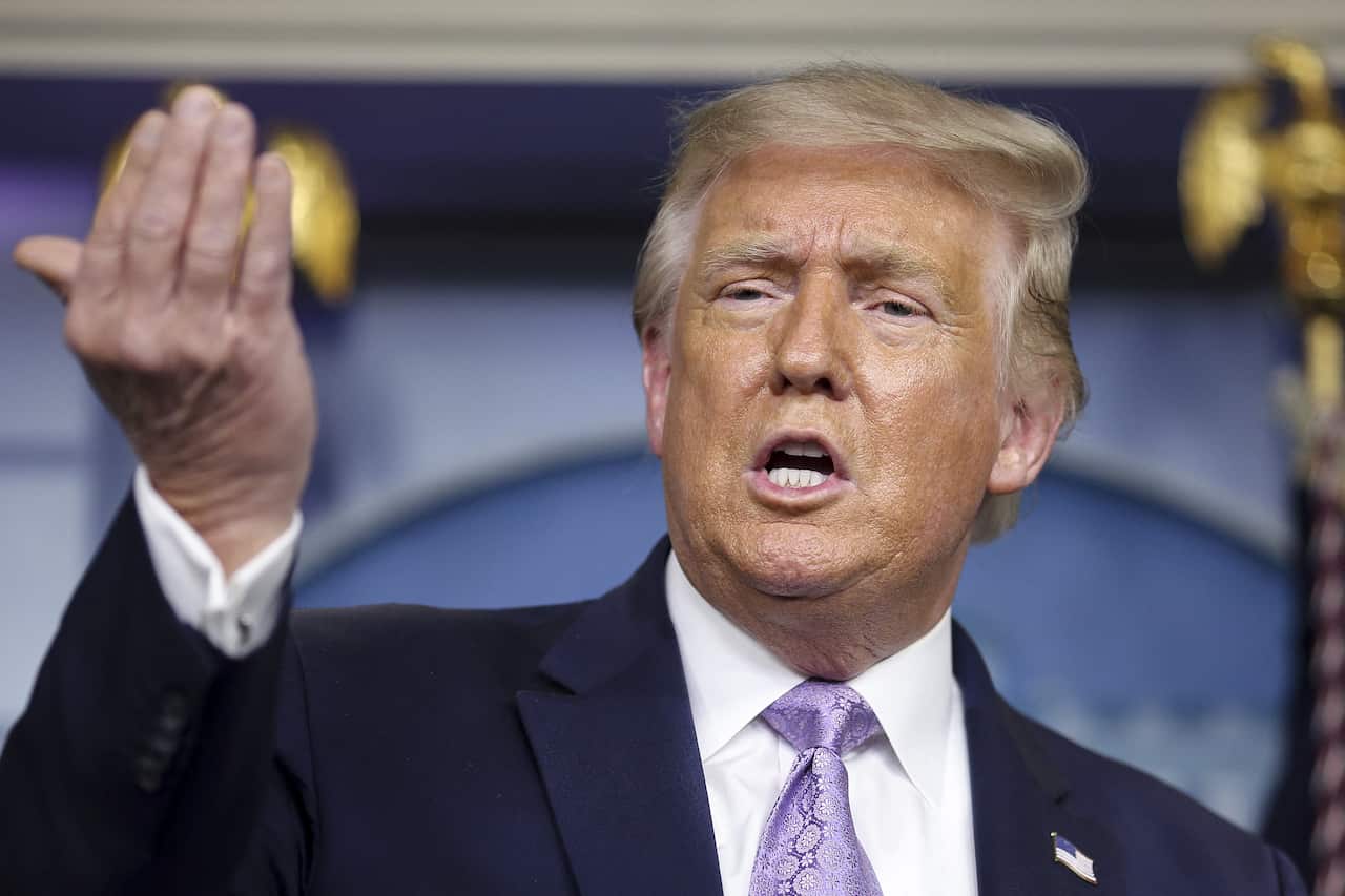 President Donald Trump speaks during a press briefing at the White House on 13 August.