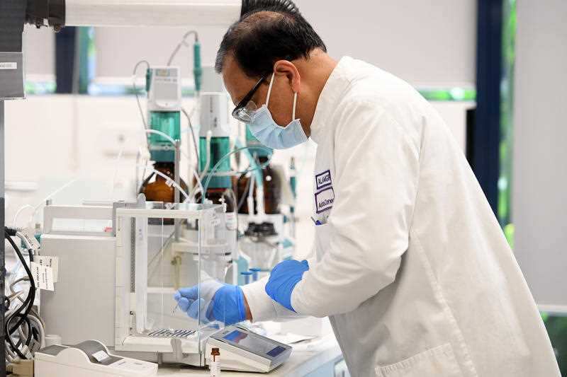 An analytical chemist in a laboratory