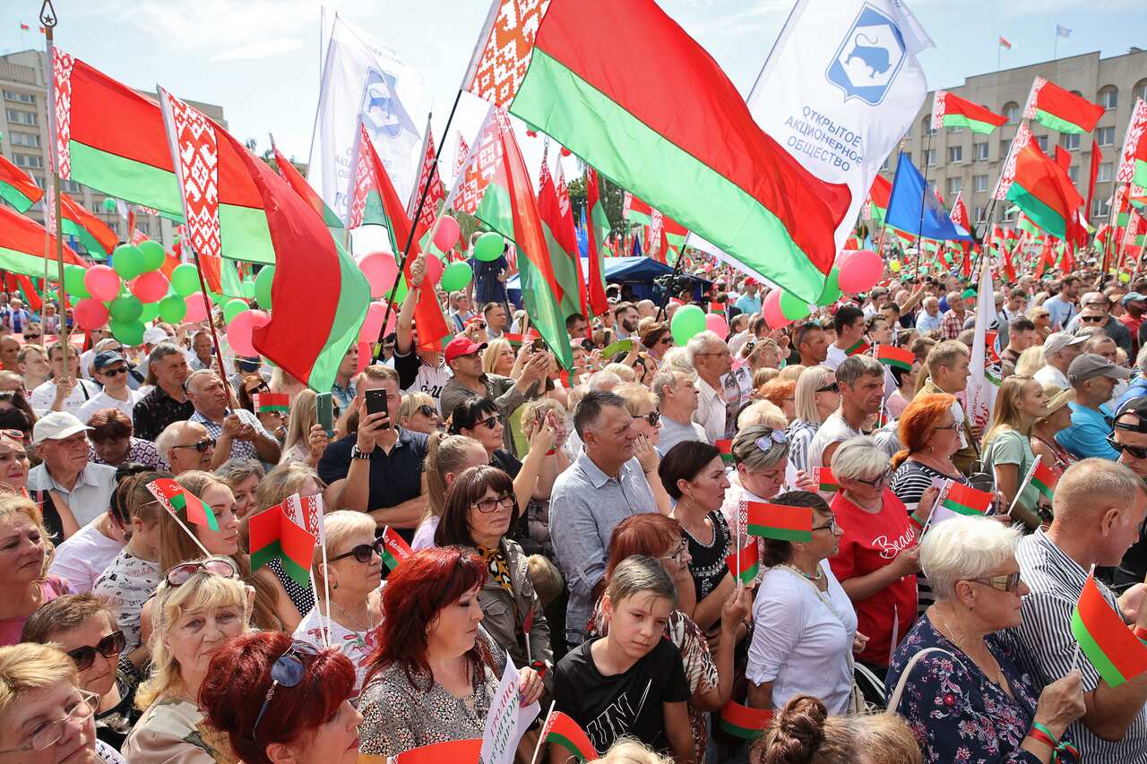 People take part in a rally in support of Belarusian President Alexander Lukashenko in Lenina Square. Belarus.