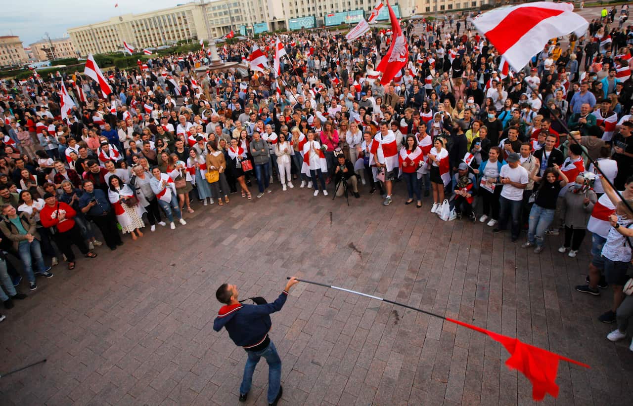 Belarusian opposition supporters gather for a protest rally in front of the government building at Independent Square in Minsk, Belarus.