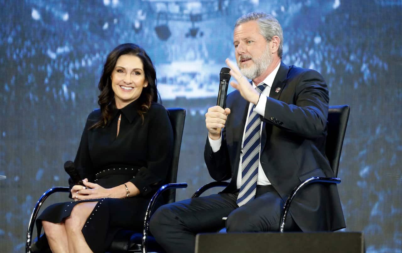 Rev. Jerry Falwell Jr., right, and his wife, Becky during after a town hall at a convocation at Liberty University in Lynchburg, Va. 