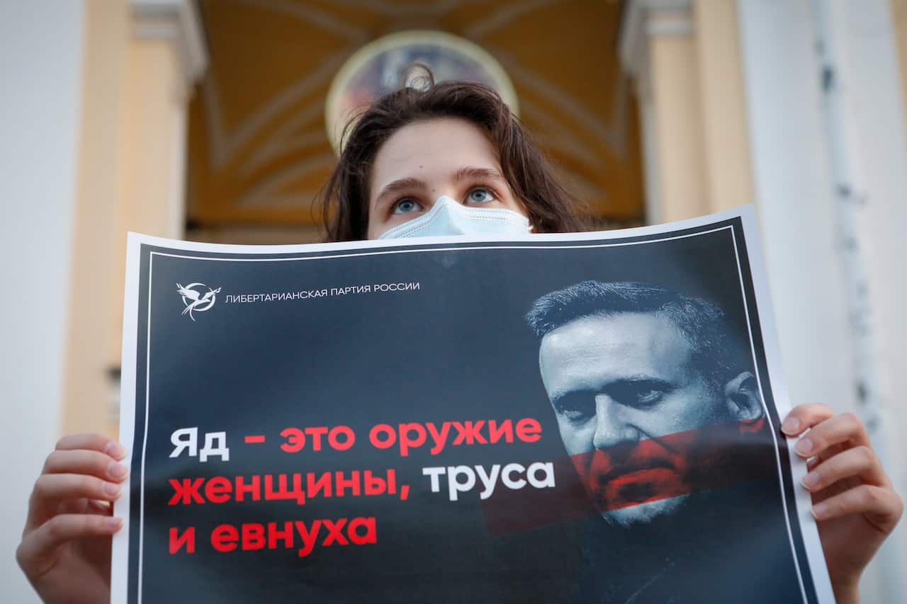 A protester demonstrates in support of Russian opposition leader Alexei Navalny in St. Petersburg, Russia.