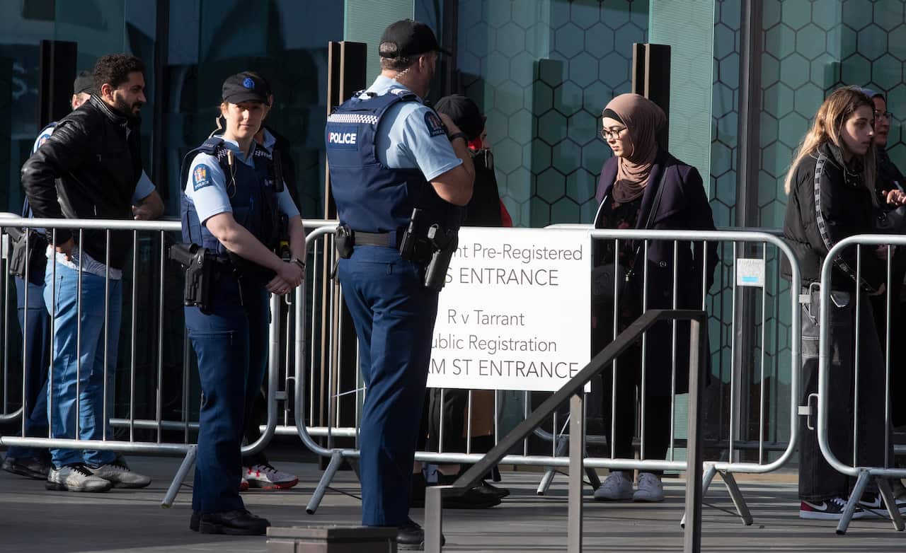 Family and survivors from the March 2019 Christchurch mosque shootings line enter the Christchurch High Court for day two of the sentencing hearing.