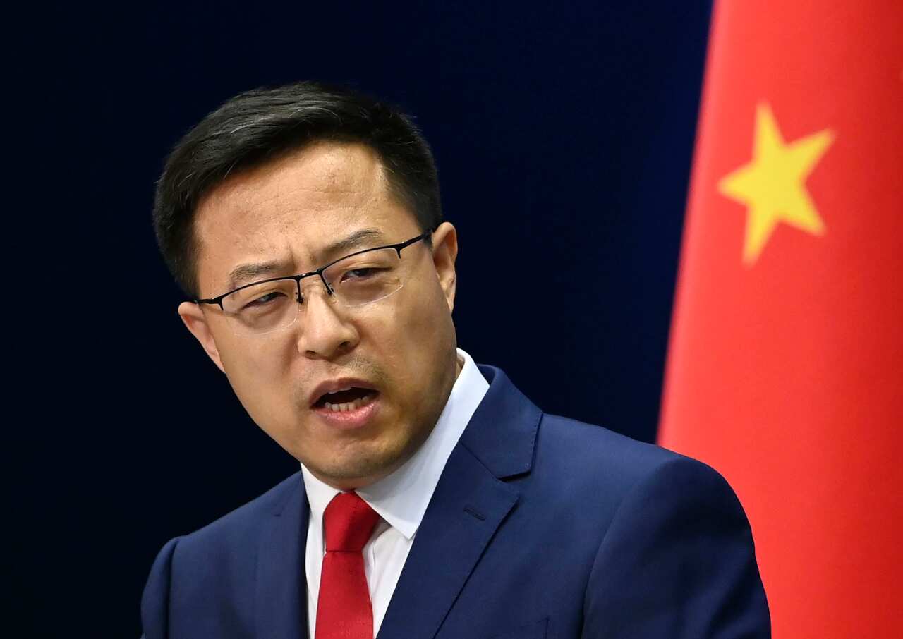 Chinese Foreign Ministry spokesman Zhao Lijian attends a press conference in Beijing.