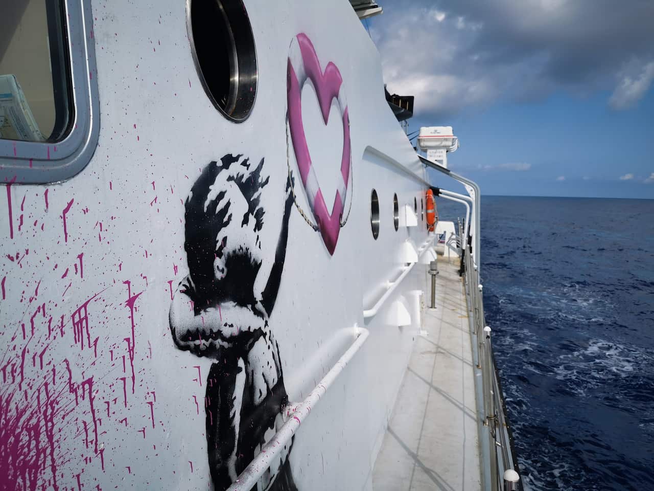 The Louise Michel, a former French navy vessel, launched under its new guise last week and features a young girl holding on to a heart-shaped safety float.
