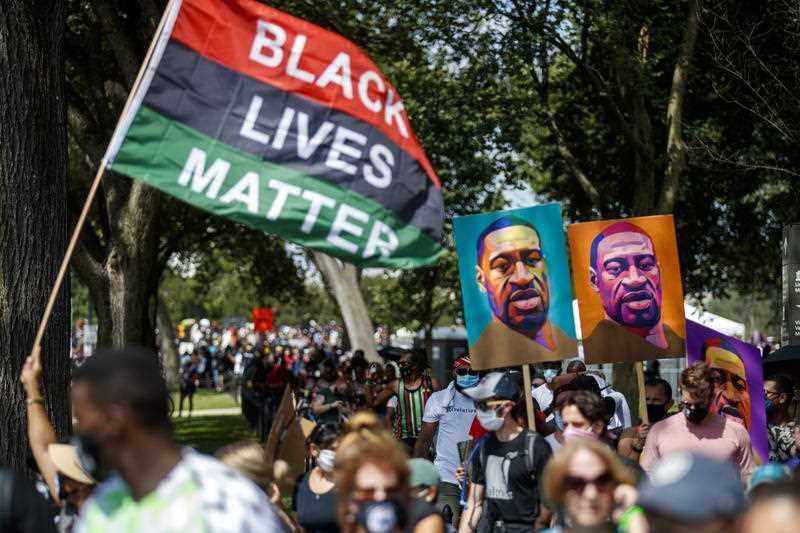 Protestors hold signs during the March on Washington. 