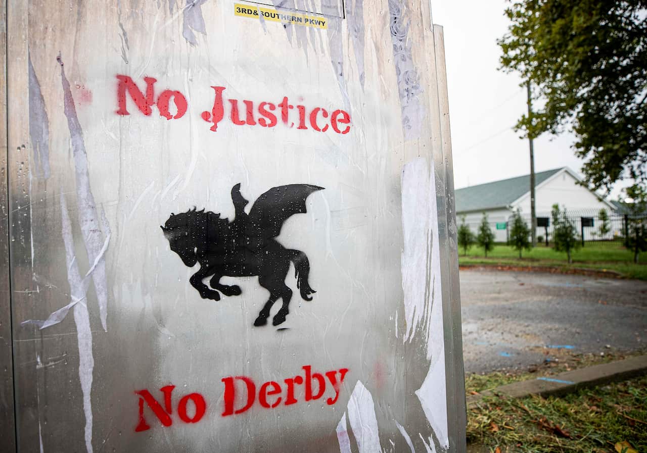 Impromptu graffiti servers as a reminder of the protests around the death of Breonna Taylor on Kentucky Derby day.