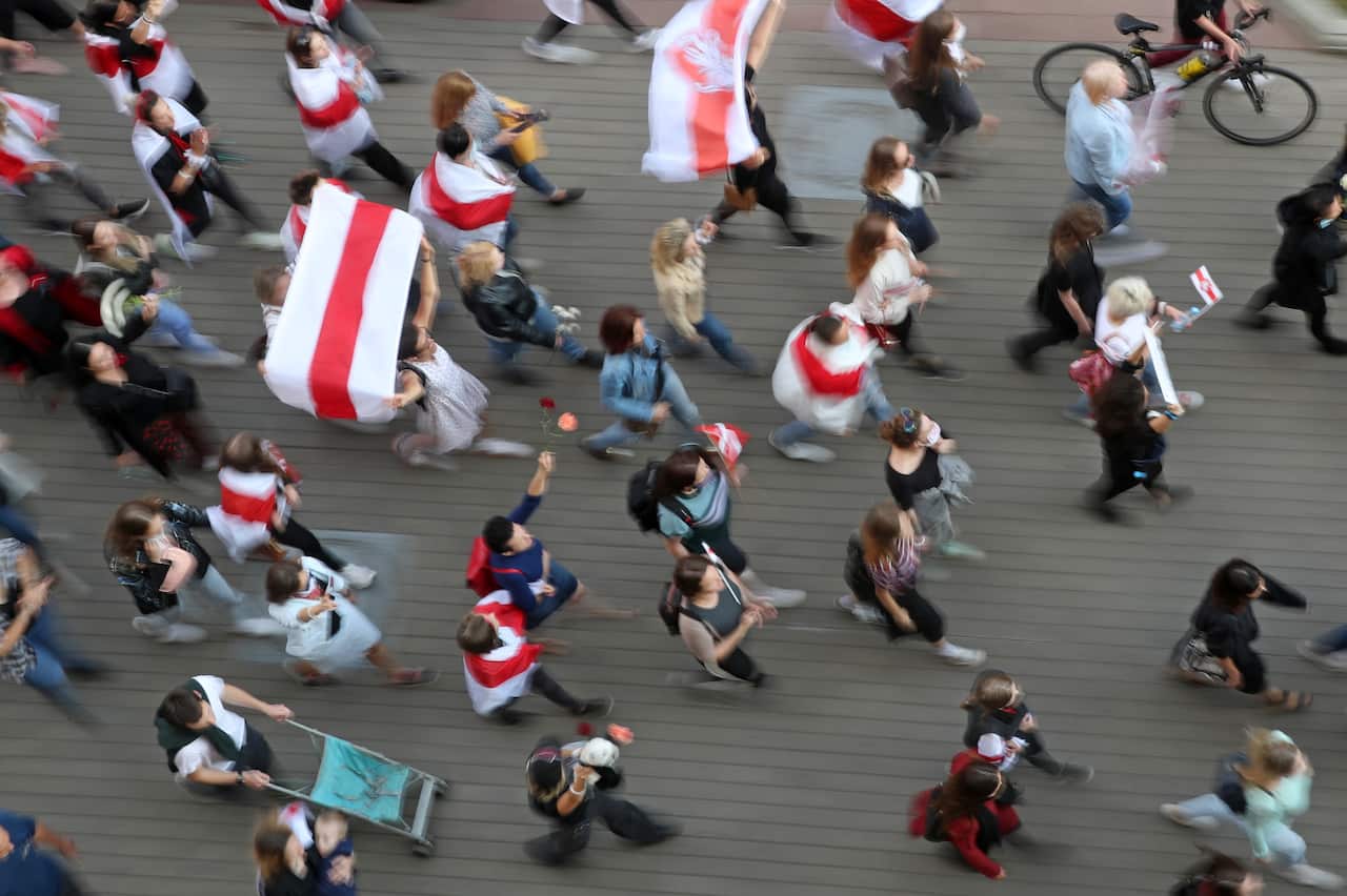 Opposition activists take part in a women's rally in Independence Avenue in Minsk, Belarus.