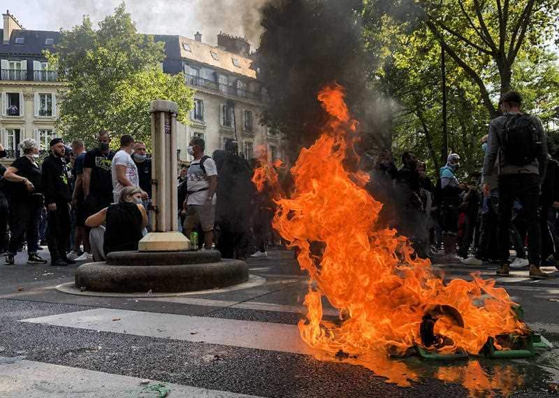  Tyres are burnt during a 'yellow vest' protest in central Paris. 