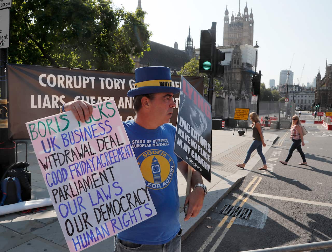 A pro European protester stands near Parliament in London.