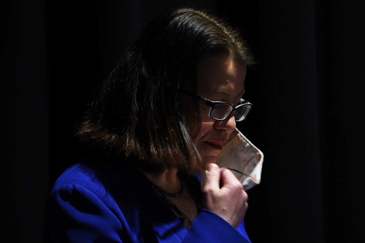 Victorian Health Minister Jenny Mikakos adjusts her face mask during a press conference in Melbourne, Wednesday, September 16, 2020. Victoria has recorded 42 new cases of coronavirus and 8 deaths in the past 24 hours. (AAP Image/James Ross) NO ARCHIVING
