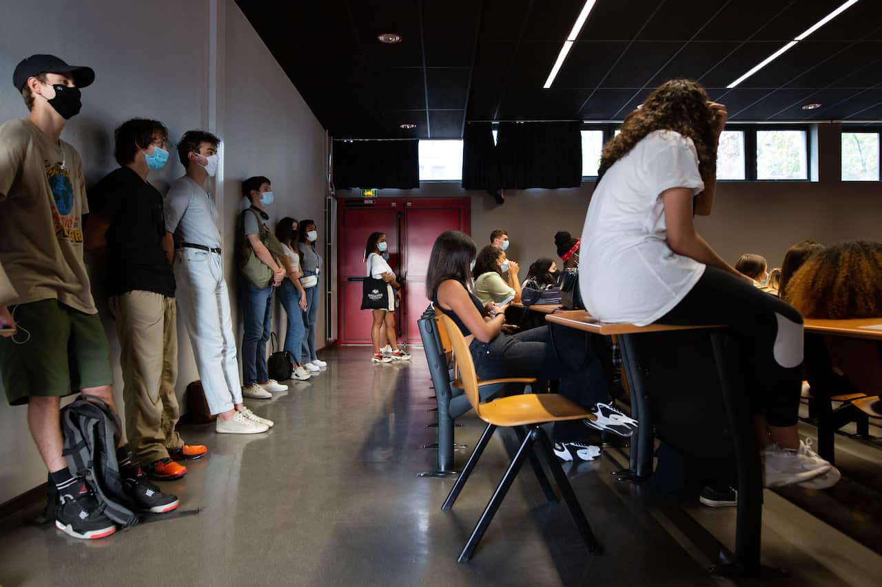 Students wear face masks as part of COVID-19 measures at La Sorbonne Nouvelle University in Paris, France.