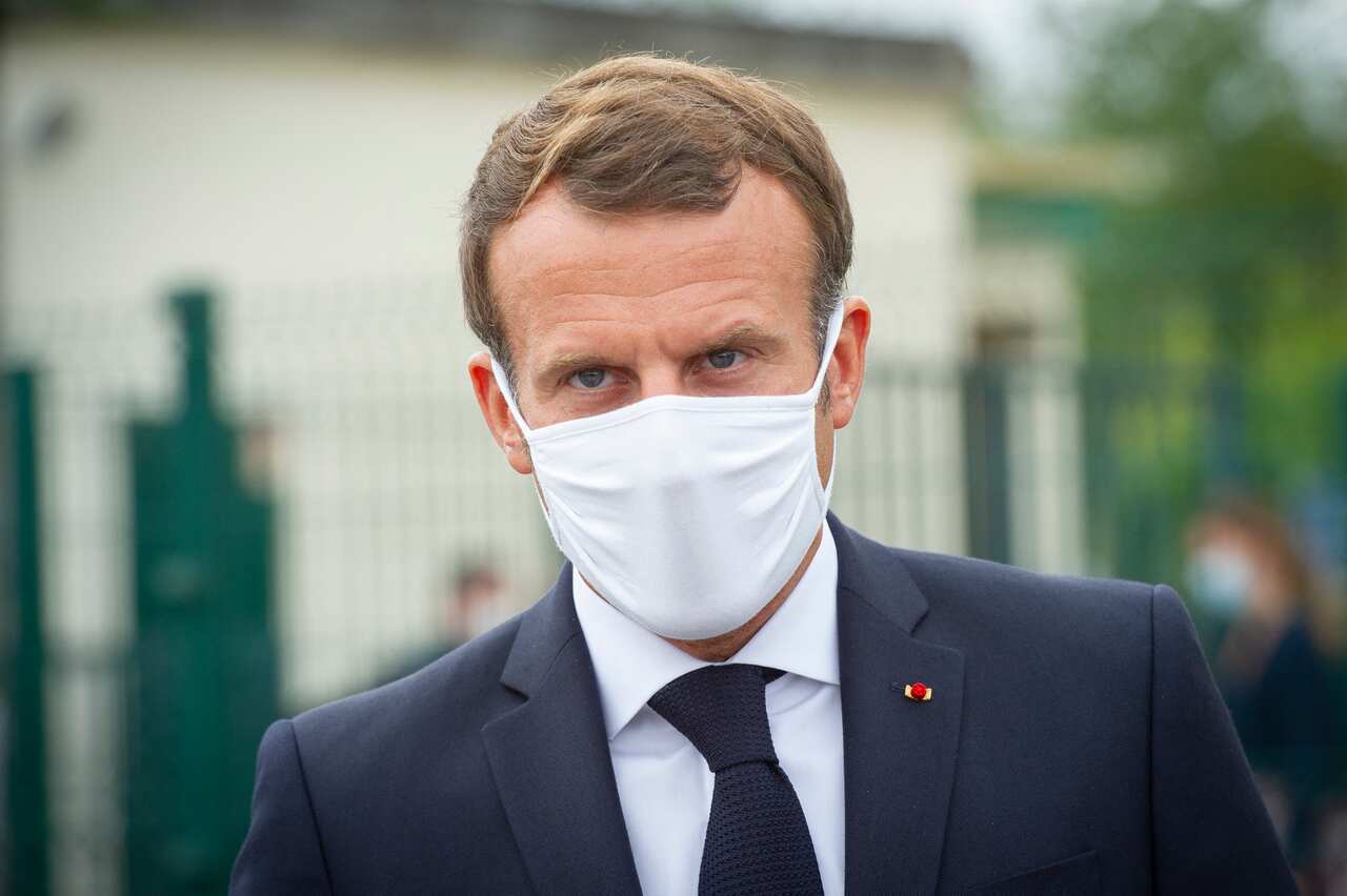 French President Emmanuel Macron has condemned the images of policemen attacking a black man.