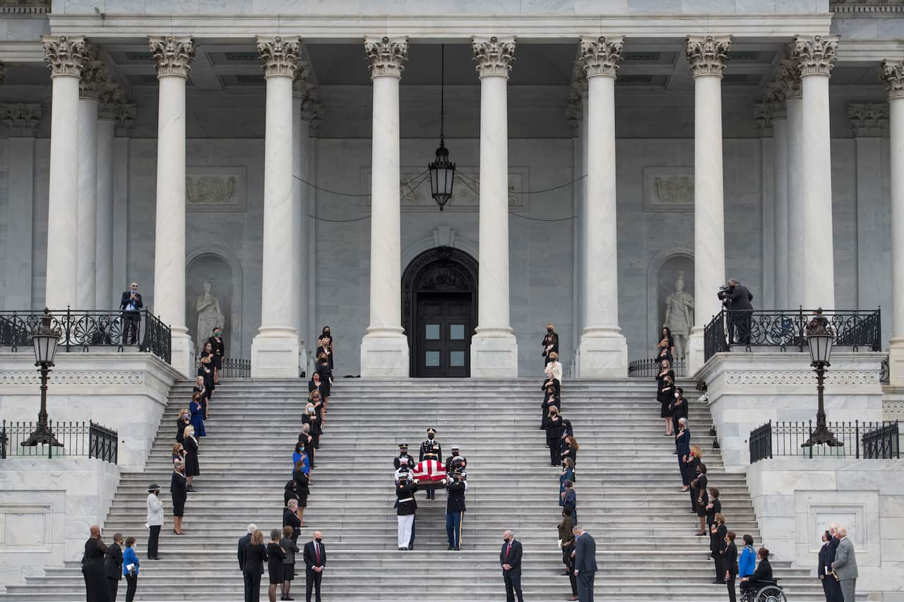 The casket carrying Supreme Court Justice Ruth Bader Ginsburg departs the US Capitol in Washington, DC on 25 September.