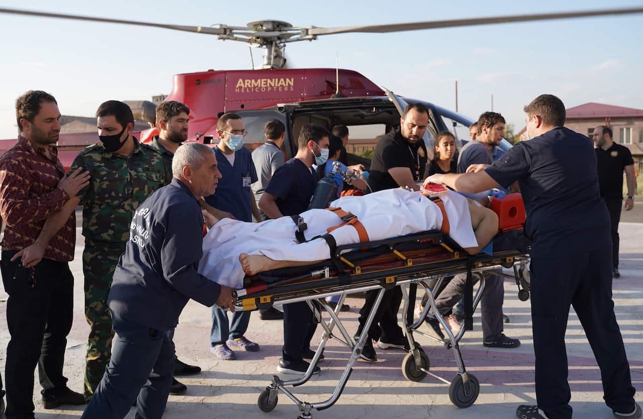 An Armenian soldier who was allegedly wounded during military clashes with Azerbaijani armed forces is being carried on stretcher, 29 September 2020.
