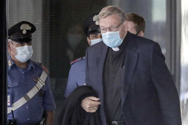 Australian Cardinal George Pell arrives at Rome's international airport in Fiumicino, Wednesday, Sept. 30, 2020. 