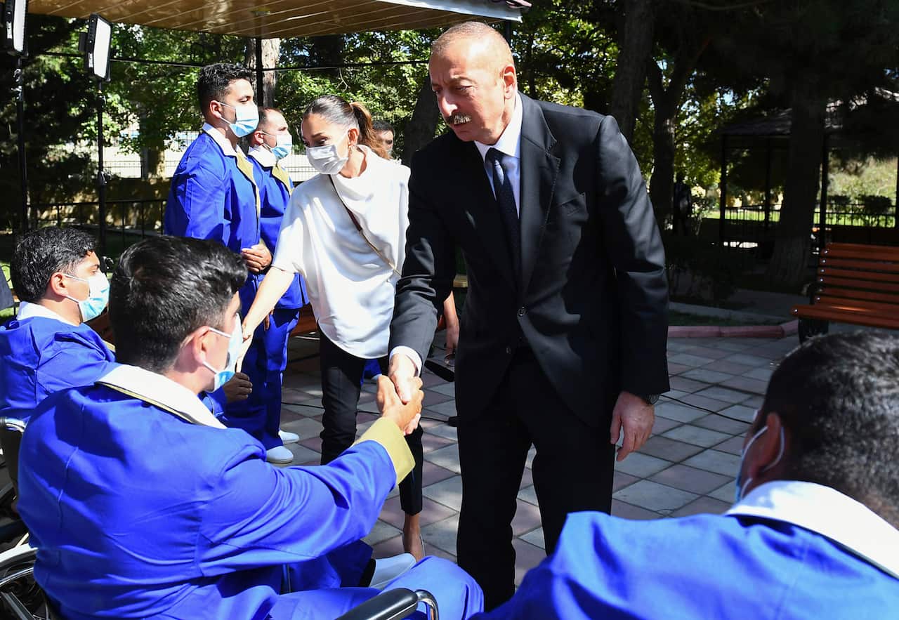 Azerbaijani President Ilham Aliyev visit the Central Military Clinical Hospital to meet with Azeri service members wounded during clashes.