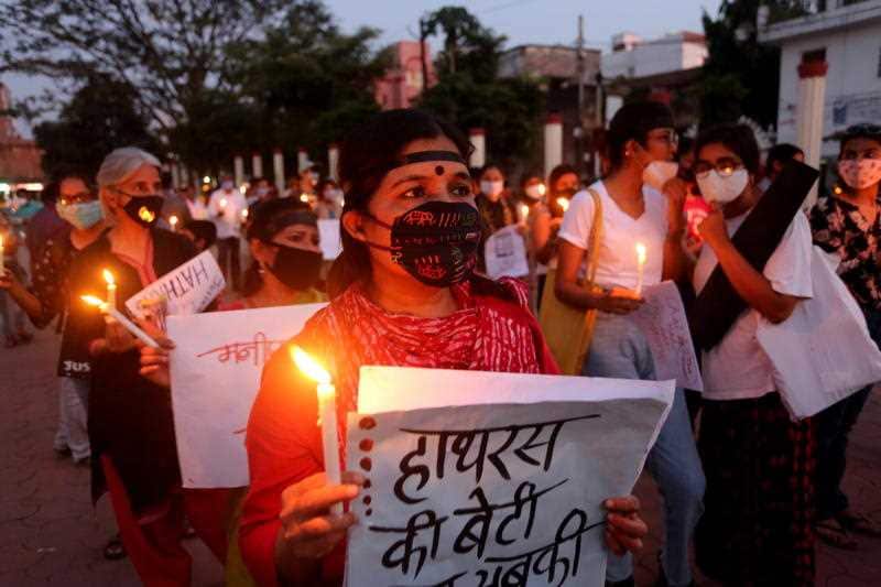 Indian activists protest against an alleged gang rape of a 19 years old Dalit girl in Uttar Pradesh state, in Bhopal, India, 1 October 2020.