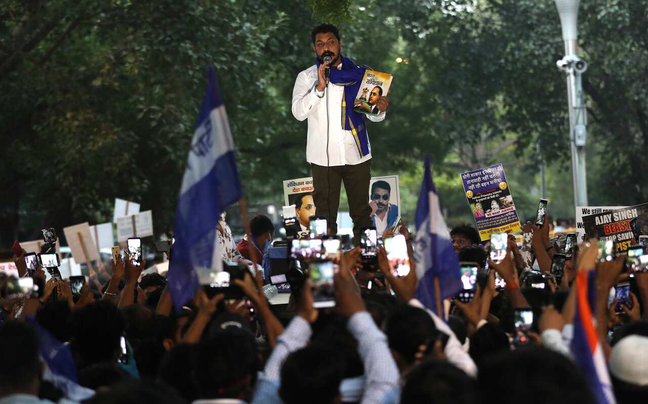 Indian activists from various organiations protest against the alleged gang rape of a young Dalit girl in Uttar Pradesh state, in New Delhi on 2 October.