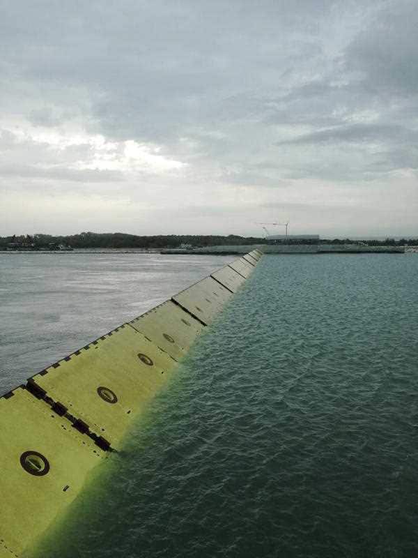 Barriers are raised during high water in Venice, northern Italy, Saturday, Oct. 3, 2020