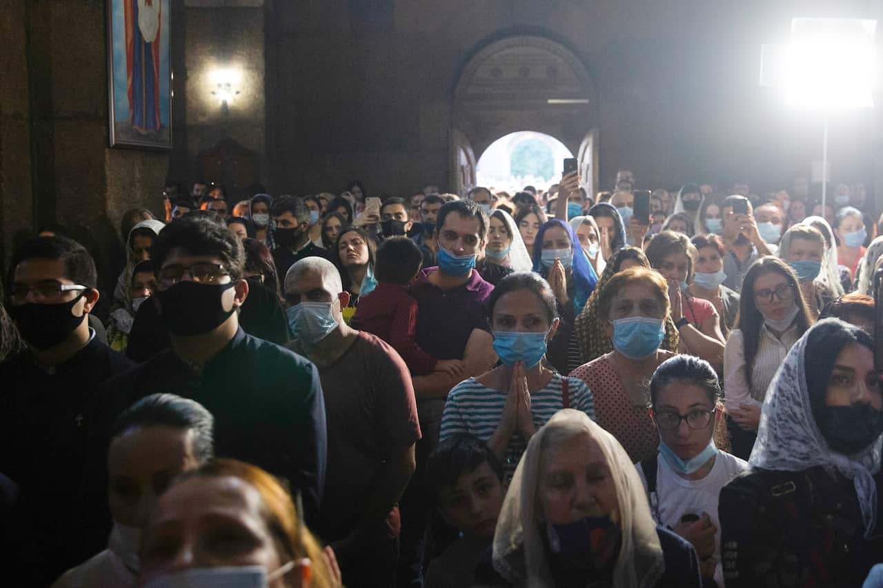 People attend a nationwide prayer for peace lead by Catholicos Karekin II in the Saint Gayane Church in Etchmiadzin, Yerevan, Armenia.